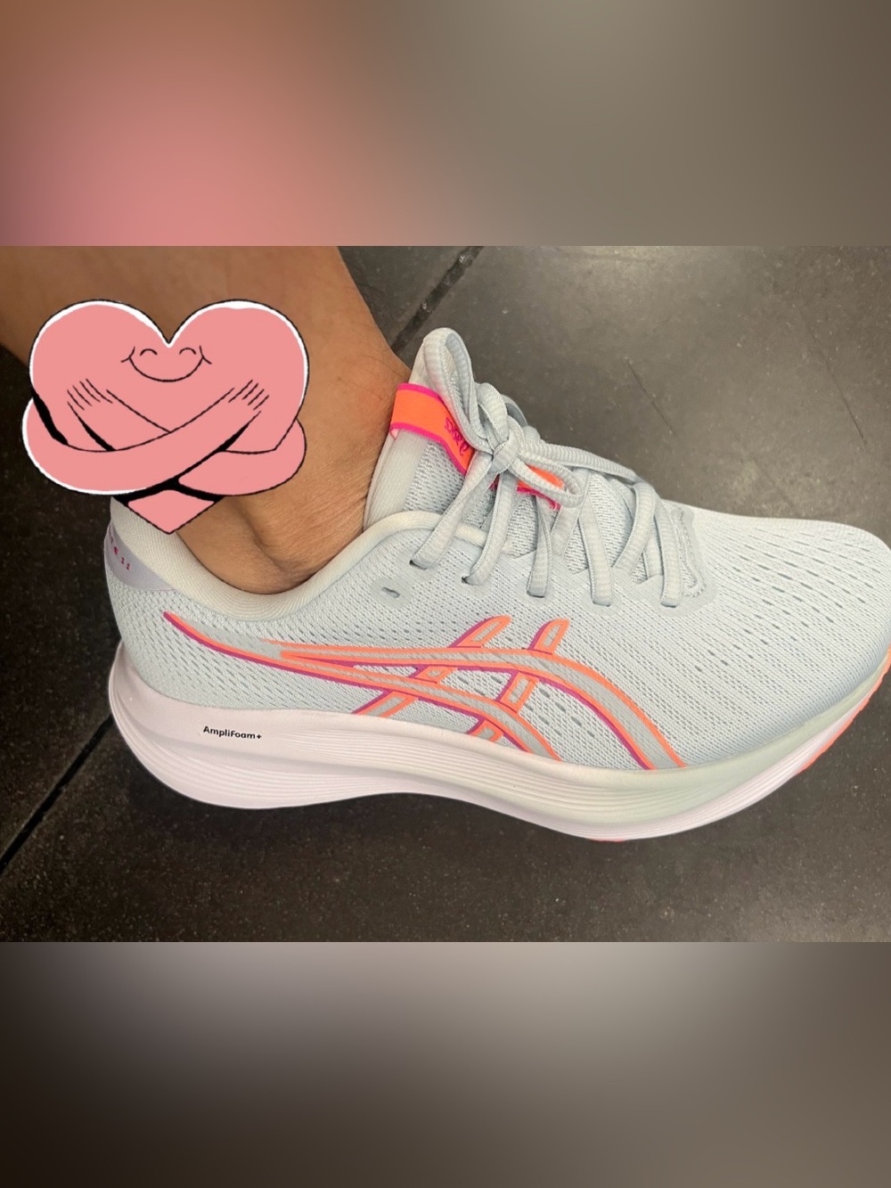 ASICS Women's Light Blue Running Shoe with Pink Accents